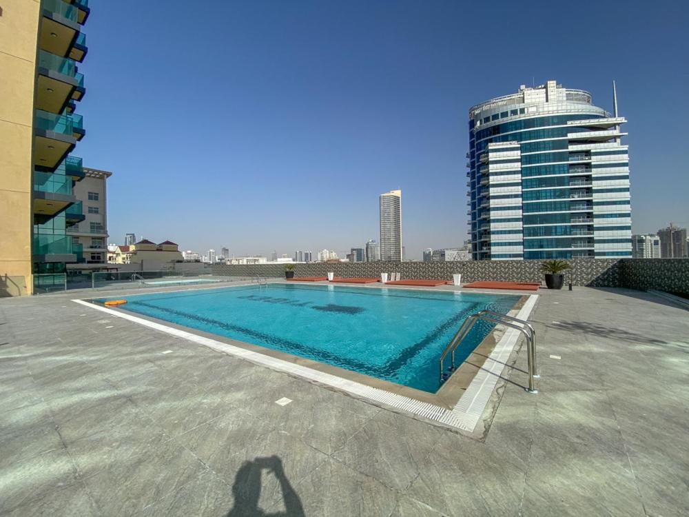 Urban Studio At The Square Tower Jumeirah Village Circle By Deluxe Apartment *